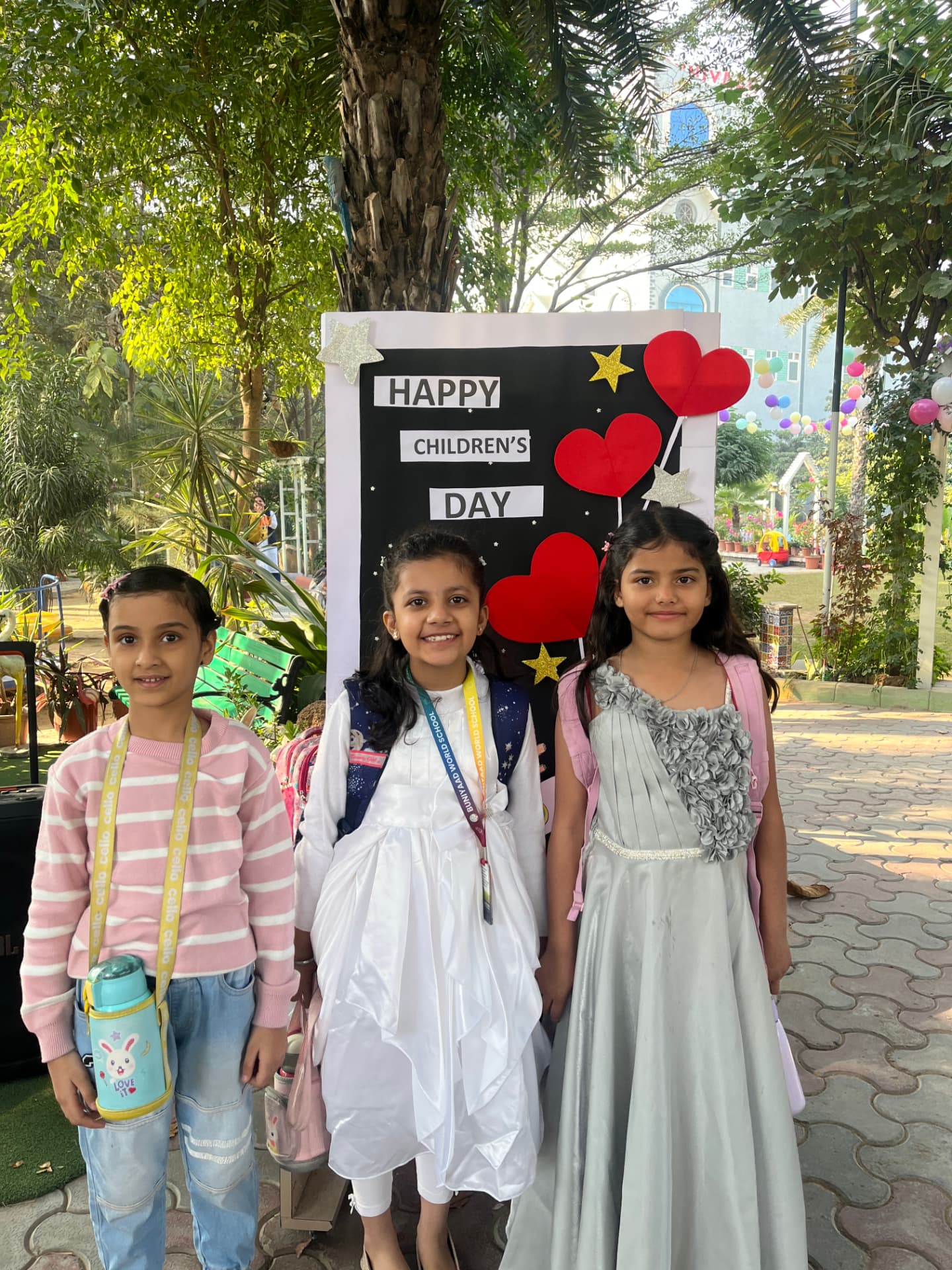 Children celebrating together on campus