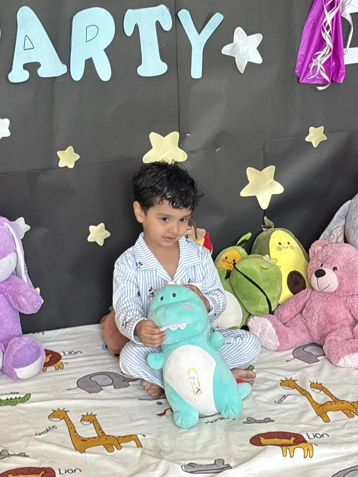 Friends smiling together in pyjamas at the school pyjama party
