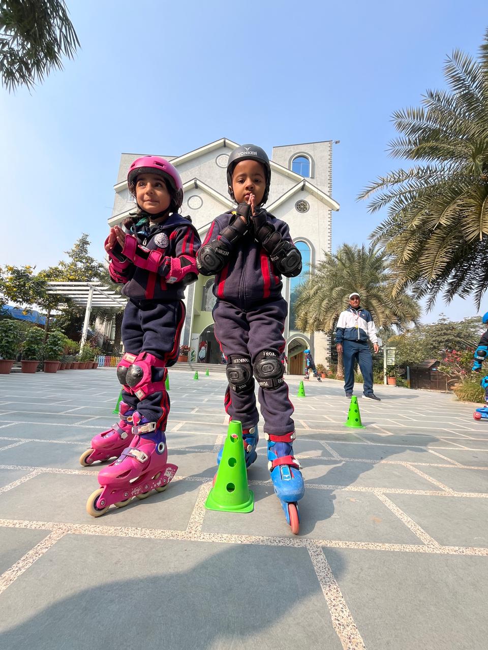 Children learning to skate safely on the sports ground