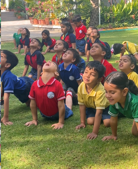Children practising yoga and mindfulness