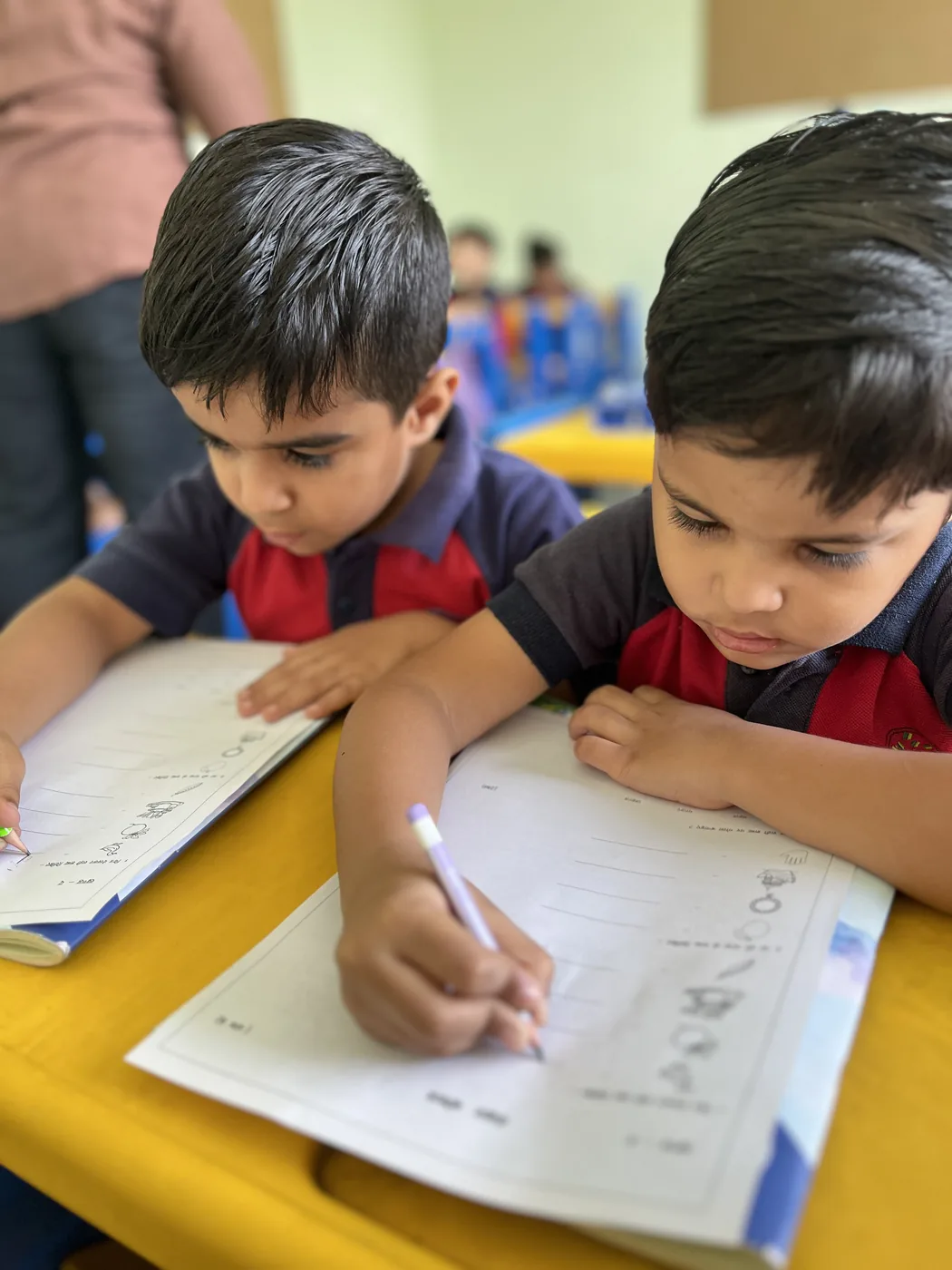 A toddler solving a sorting and matching activity