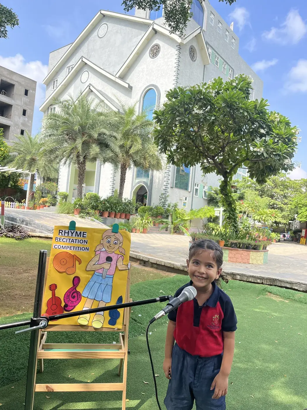 A teacher sharing a picture story with toddlers