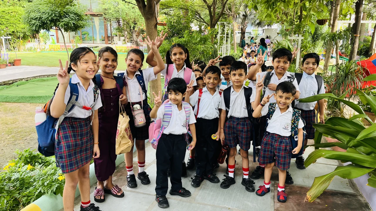 Buniyaad World School students smiling in the school garden