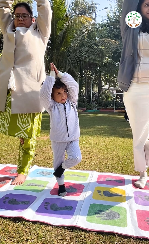Mothers and children hand painting together