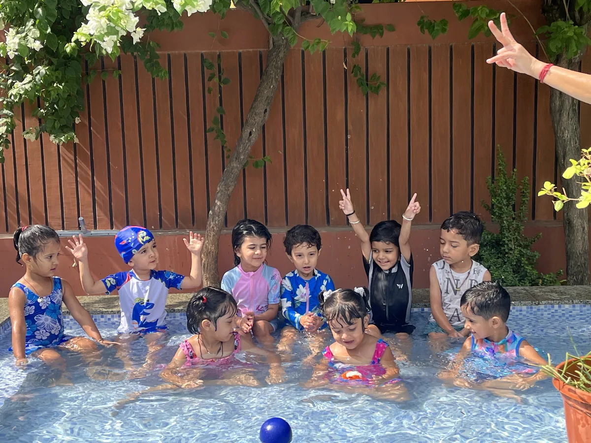 Children splashing during water play